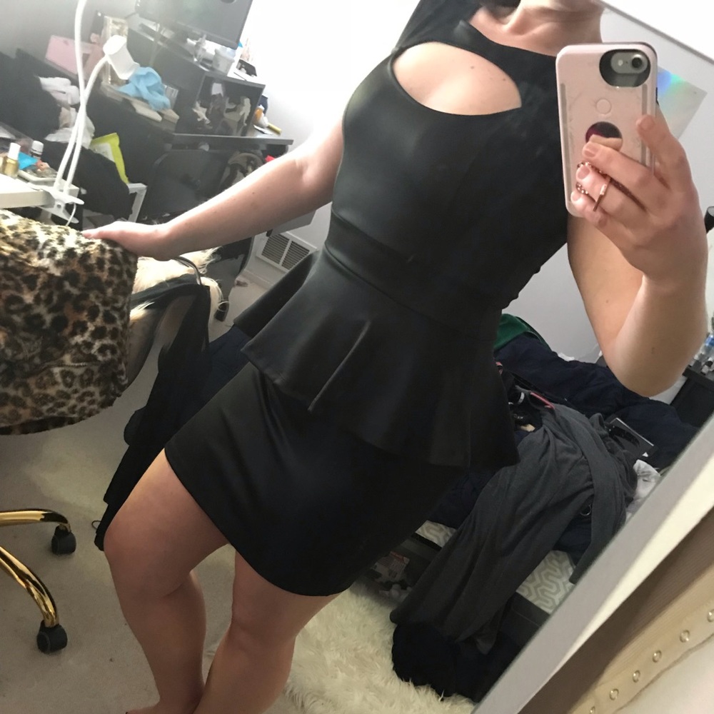 Black peplum sleeveless cut out dress